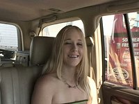 A nice looking blonde masturbates in the car with a hard purple dildo - movie 3 - 2