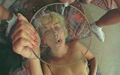 A blonde girl drinks cum through a funnel - movie 3 - 7