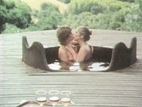 Watch Now - Two women share a guy and his cock in a hot tub on an outdoor deck