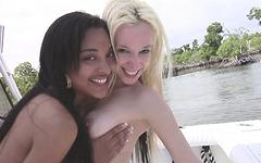 Black on white lesbian mutual masturbation and sex play on a boat outdoors - movie 5 - 5