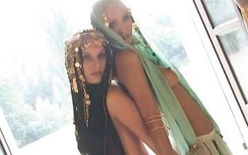 Scaricamento This softcore lesbian nude massage has an arabian nights cosplay feel
