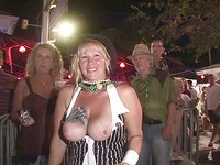 Ver ahora - Horny sluts show off their tits at this group outdoor strip party