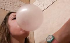 Marie Madison blows a bubble and pops it on her face - movie 3 - 4