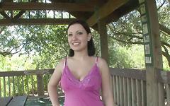 A busty girl shows those nice tits at an outdoor location during the day - movie 7 - 5