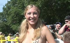 More college girls undress in a huge event trying to win strip contest - movie 2 - 7