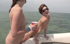 A couple of lesbian teens play with each other on the naked boat trip - movie 8 - 3