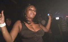 Shaquira walks the street and shows her breasts join background