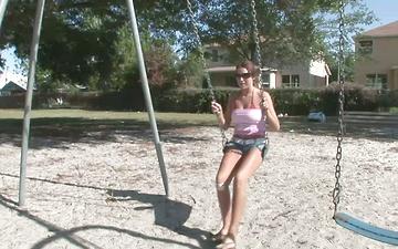 Download Big boobed honey strips naked at the swingset outdoors and flashes everyone