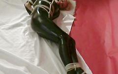 Ver ahora - Blonde with big boobs in a latex jumpsuit is severely hogtied in bdsm scene