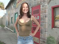 Hot brunette amateur flashes her tits out on the streets - movie 2 - 2