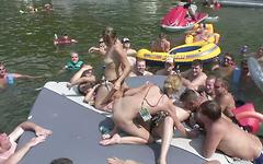 Olivia starts to strip in front of everyone on the boat - movie 2 - 4