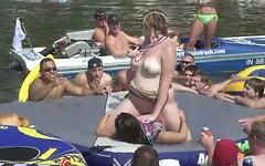 Tabitha starts to strip in front of everyone on the boat - movie 4 - 7