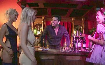 Download A few amazing girls share a cock in the bar and get each other off too
