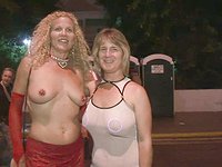 Watch Now - Party milfs with big boobs flash their tits in public