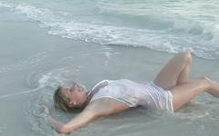 Sexy blonde amateur frolics in the surf and shows off her slender body - movie 8 - 5