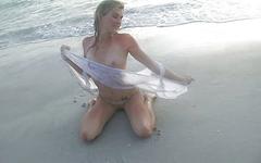 Sexy blonde amateur frolics in the surf and shows off her slender body - movie 8 - 6