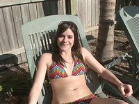 Pretty amateur brunette takes off bikini and plays with pussy at pool - movie 6 - 2