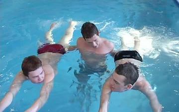 Download Hung twinks and jock have a bareback threesome at a swimming pool
