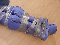 Completely encased female is bound with duct tape in BDSM bondage scene - movie 2 - 2