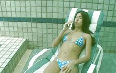 Watch Now - Brazilian brunette andrea brito masturbates on a pool chair.