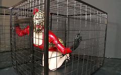 Latex Lucy gives a blowjob through a cage and drinks cum out of a condom - movie 4 - 2