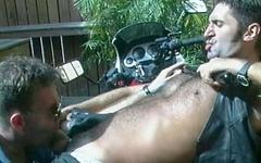 Hot cop in uniform gives a blowjob to a perp as he sits on a motorcycle - movie 1 - 5