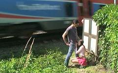 Lucie has a threesome next to train tracks as a locomotive steams by - movie 5 - 3