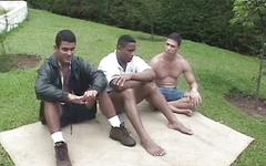 Watch Now - Athletic latino jocks and a black hunk have a threesome in the park