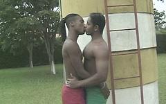 2 muscular black jocks have anal sex outside in a park. join background