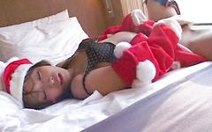 Wearing a Christmas costume this Japanese girl rubs her own pussy - bonus 1 - 6