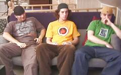 Toned skater jocks masturbate and suck cock in a threesome on the couch - movie 1 - 2