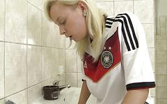 Blonde soccer star Naomi Nevena masturbates in the bathroom. join background