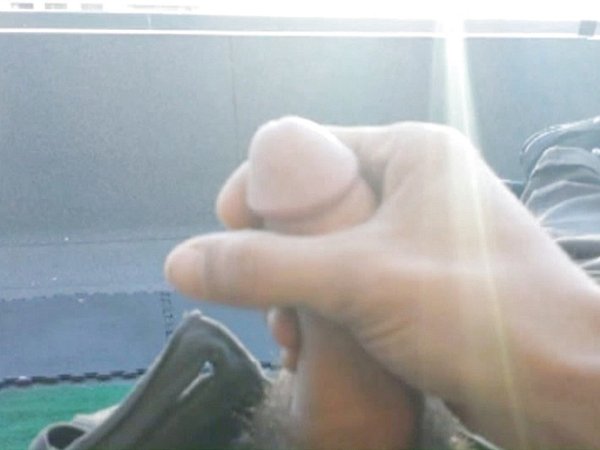 Damon Dogg wanks his nice dick outside while smoking.