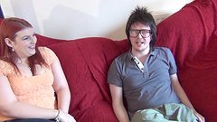 Watch Now - Slutty curvy red head gives a blowjob to a dorky nerd