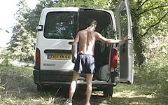 Toned jock fucks a blow up doll outside next to his van join background