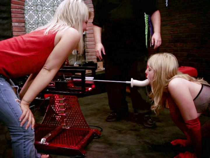 Emma Flails in Fishnet Body Stocking in Dungeon Sling Fuck Machine 3way still 2