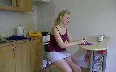 Monika masturbates with a bullet vibrator in the kitchen. join background