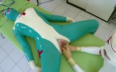 Clanddi Jinkcego and Lucy Latex Get Physical On The Medical Table - movie 1 - 6