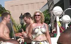 Sexy wet t-shirt contest around a stripper pole at beach party - movie 4 - 6