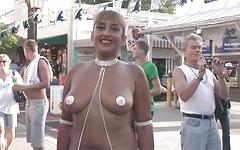 Ver ahora - Topless women wear nothing but body paint to cover their tits in public