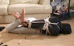 naughty Rashir wears High heels and is bound with rope join background