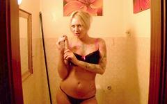 horny blonde with tattoos fucks a big rubber dick in the bathroom - movie 4 - 2