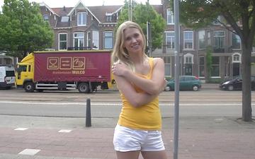 Télécharger Blonde dutch hottie strips down and masturbates on a couch