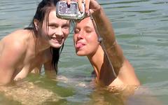 Ester and Sara finger bang on the beach - movie 1 - 2