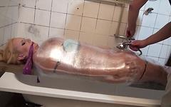 Watch Now - Angel wicky is fully wrapped in plastic wrap which is filled with water