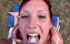 What a sexy red head whore getting throat fucked outdoors on the grass - movie 30 - 7