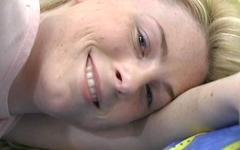 A pale skinned blonde with a bare shaven pussy masturbates using a sex toy - movie 4 - 7