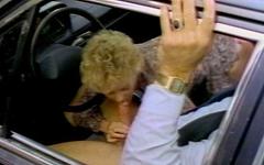 A mature blonde sucks on her mans cock and he fucks her there in the car - movie 5 - 2