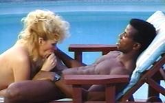 Big boobed blonde goes for a ride on a massive black cock by the poolside - movie 7 - 4